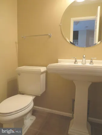 a view of deck with wooden floor and fence