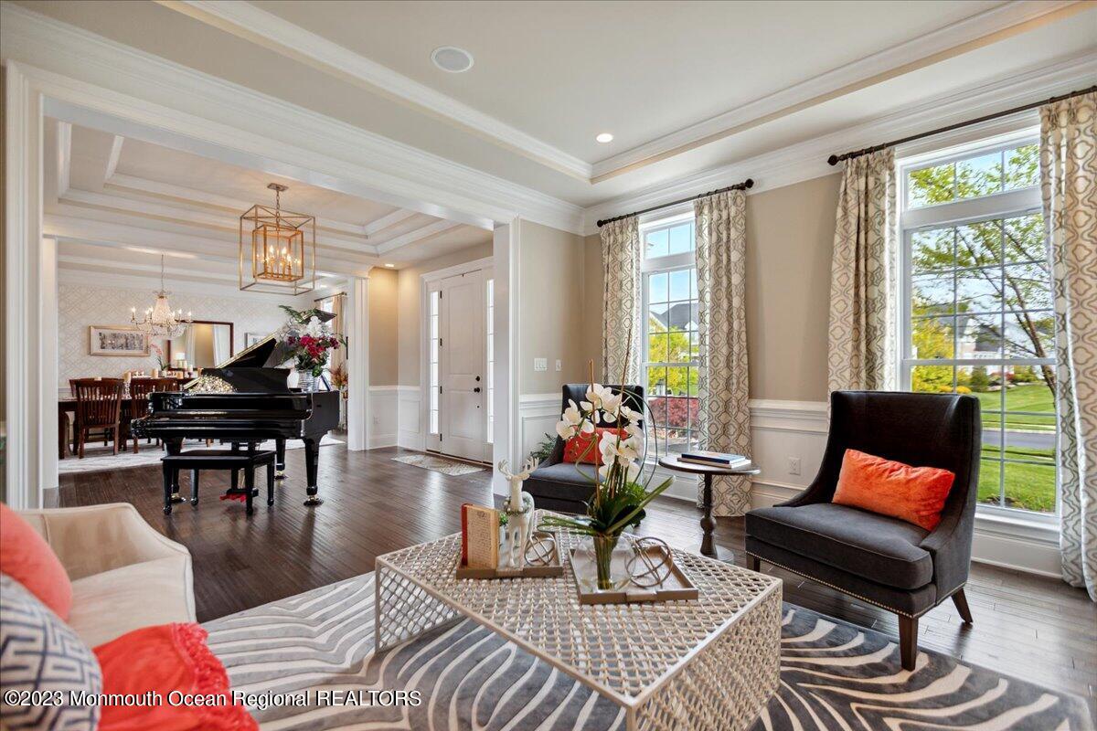 25 Windermere Road Lincroft, NJ 07738 - Photo 11 of 70 a living room with furniture and wooden floor