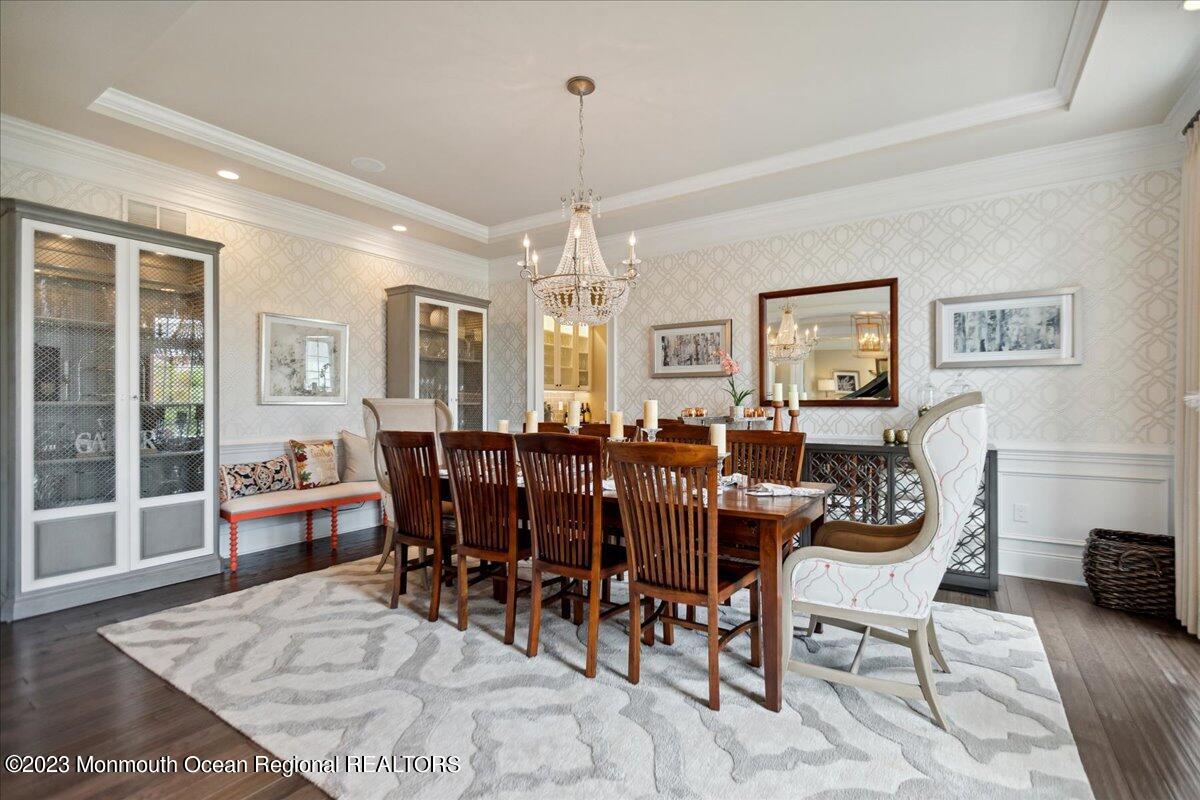 25 Windermere Road Lincroft, NJ 07738 - Photo 12 of 70 a view of a dining room with furniture window and wooden floor