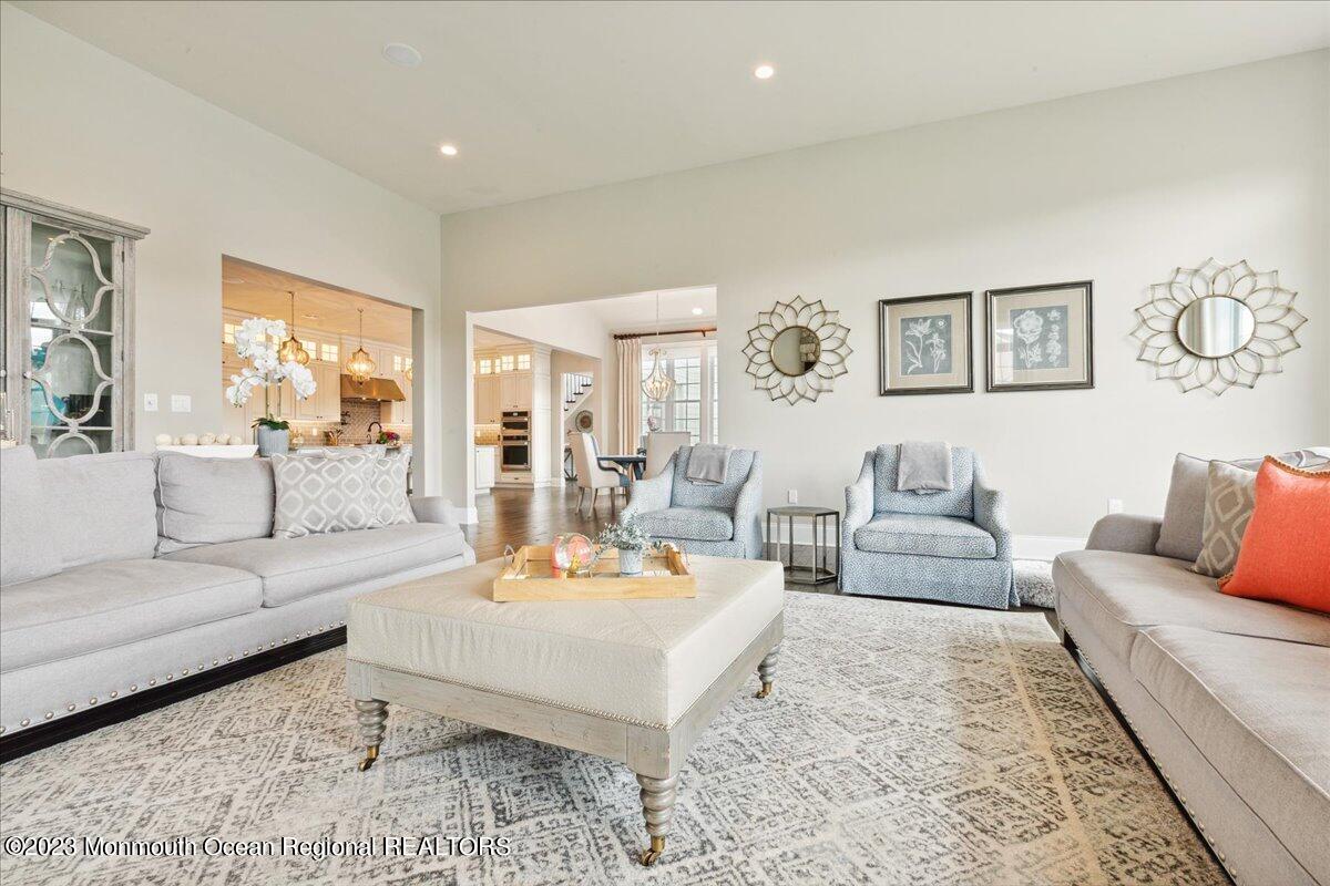 25 Windermere Road Lincroft, NJ 07738 - Photo 23 of 70 a living room with furniture and wooden floor