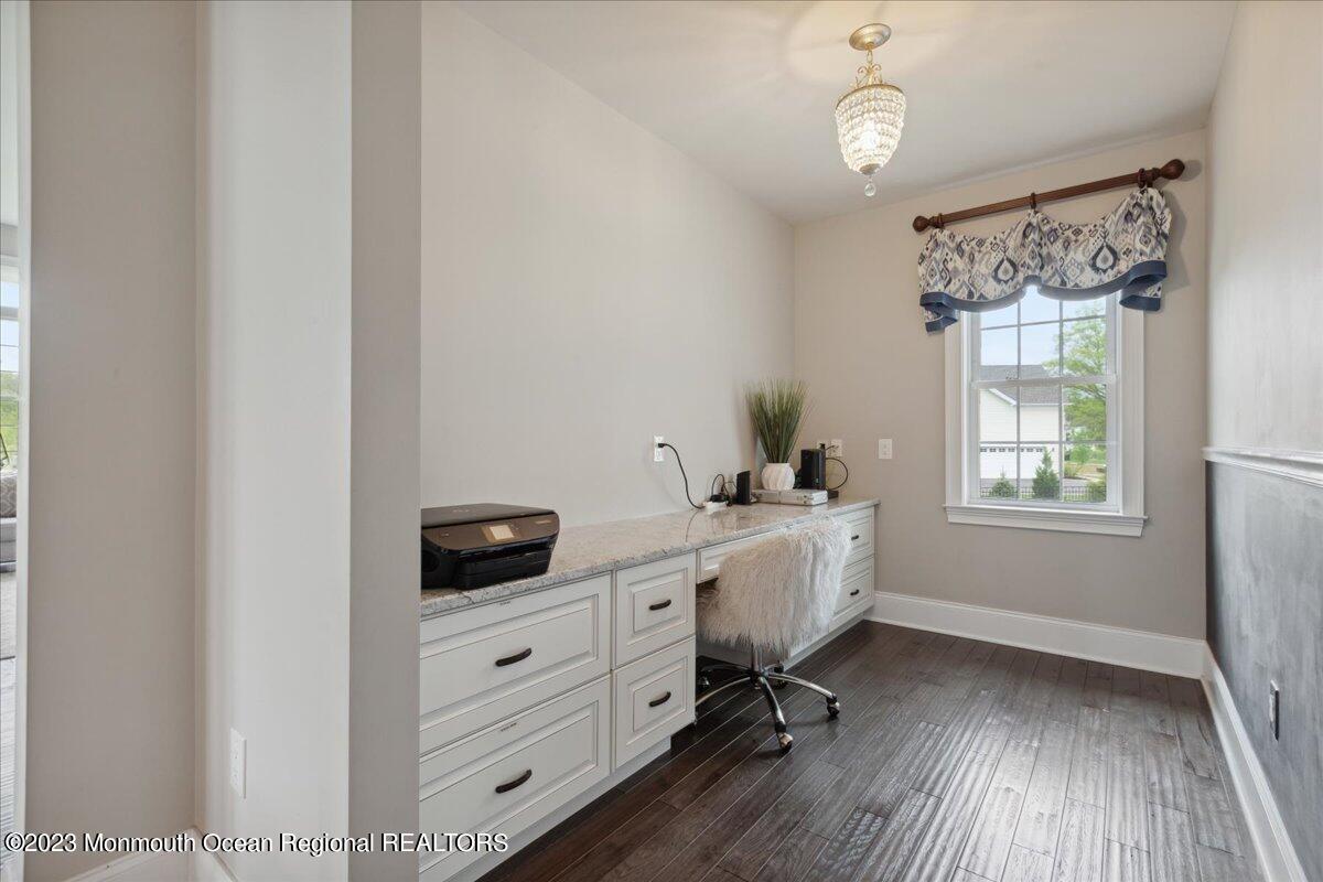 25 Windermere Road Lincroft, NJ 07738 - Photo 24 of 70 a view of a workspace with furniture and a window