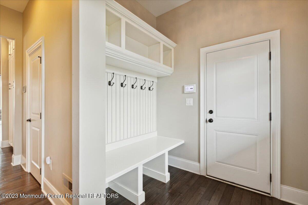25 Windermere Road Lincroft, NJ 07738 - Photo 30 of 70 a view of an entryway with wooden floor