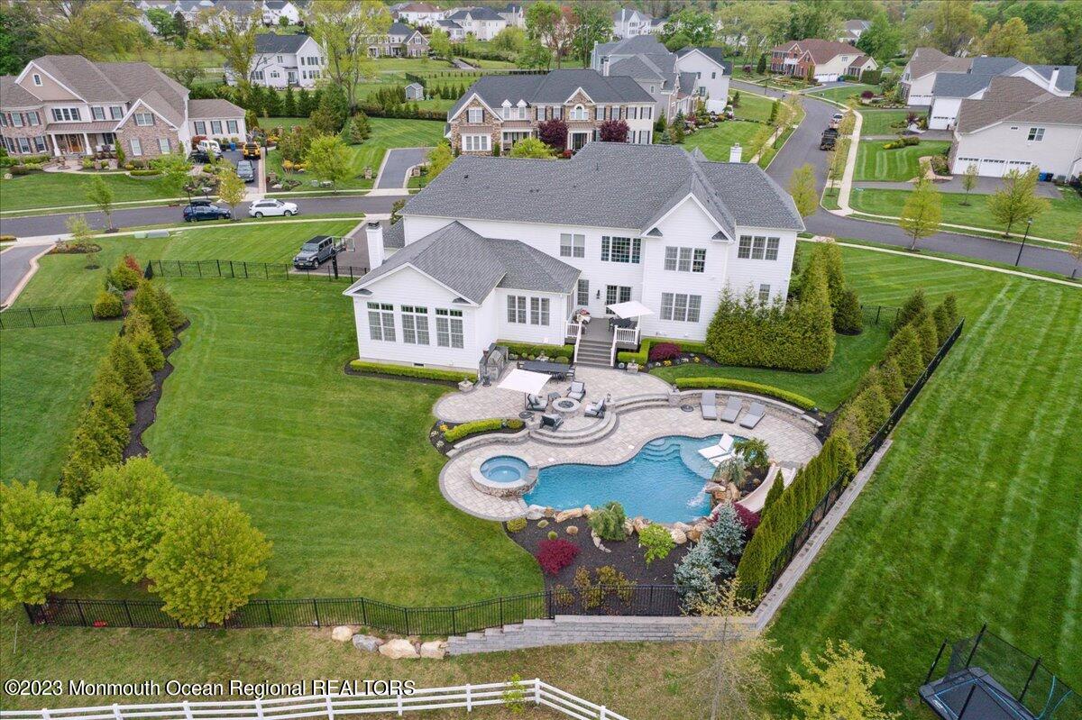 25 Windermere Road Lincroft, NJ 07738 - Photo 66 of 70 an aerial view of a house with garden space ocean and mountain view in back