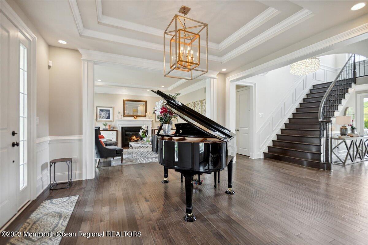 25 Windermere Road Lincroft, NJ 07738 - Photo 7 of 70 a view of entryway and hall with wooden floor