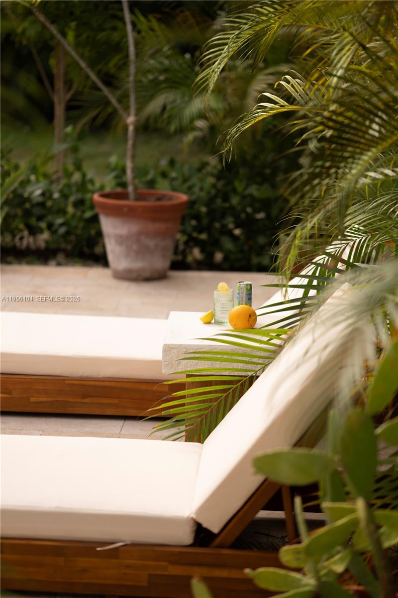 3616 Southwest 26th Street Miami, FL 33133 - Photo 54 of 77 a view of swimming pool with seating space