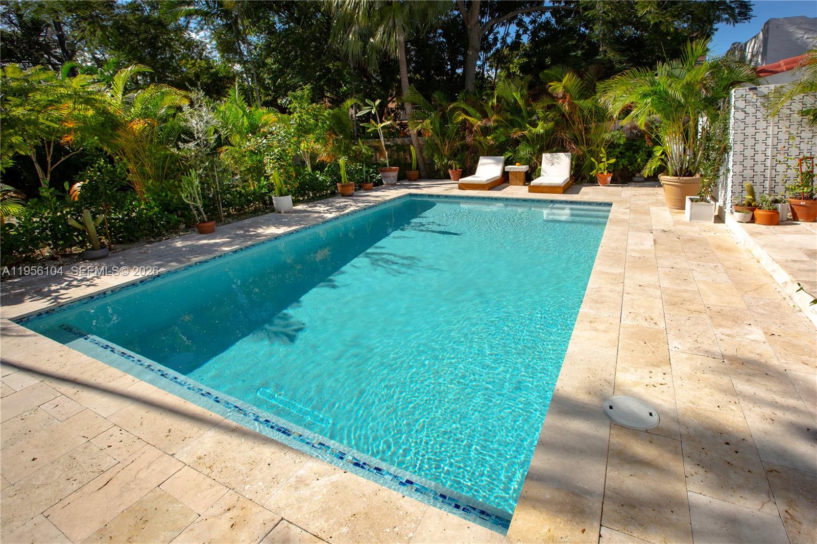 3616 Southwest 26th Street Miami, FL 33133 - Photo 58 of 77 a view of swimming pool with a patio