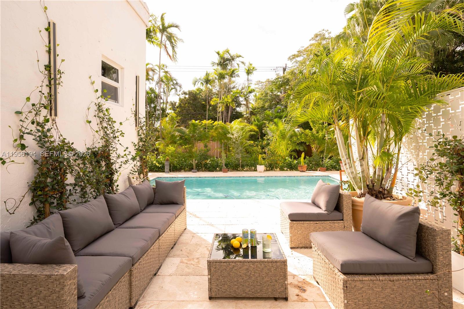 3616 Southwest 26th Street Miami, FL 33133 - Photo 61 of 77 a view of sitting area with furniture and wooden floor