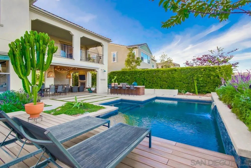 15497 Tanner Ridge Road San Diego, CA 92127 - Photo 15 of 48 a view of an house with backyard porch and furniture
