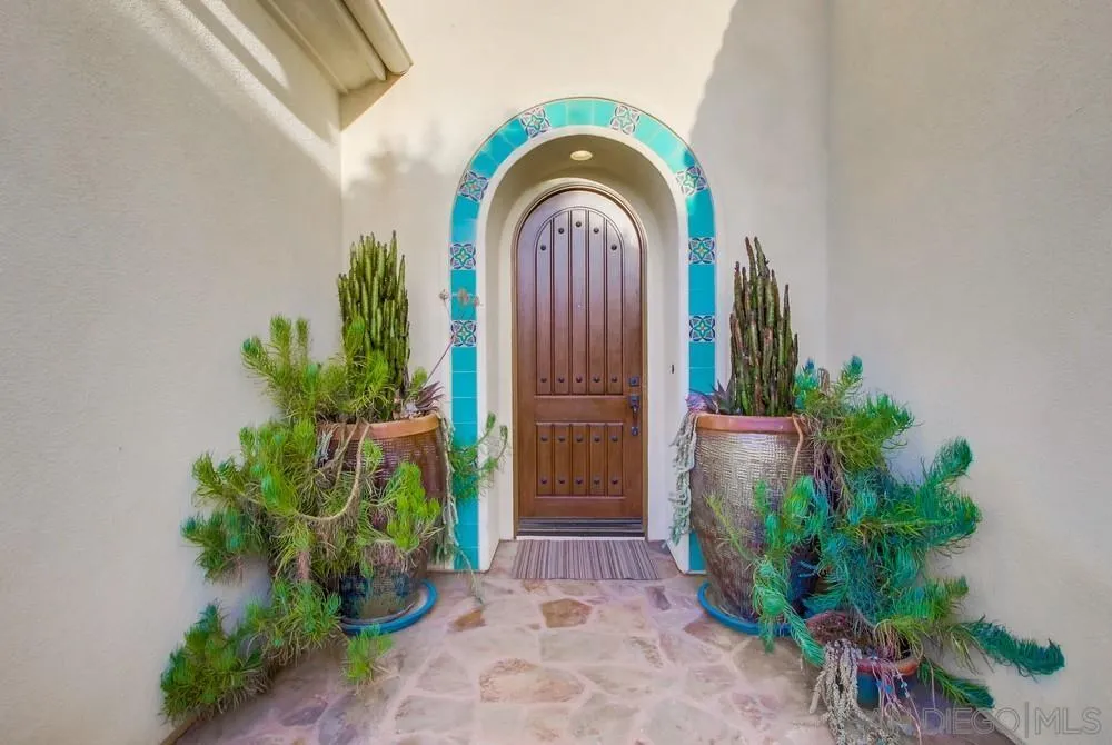 15497 Tanner Ridge Road San Diego, CA 92127 - Photo 2 of 48 a view of a house with potted plants