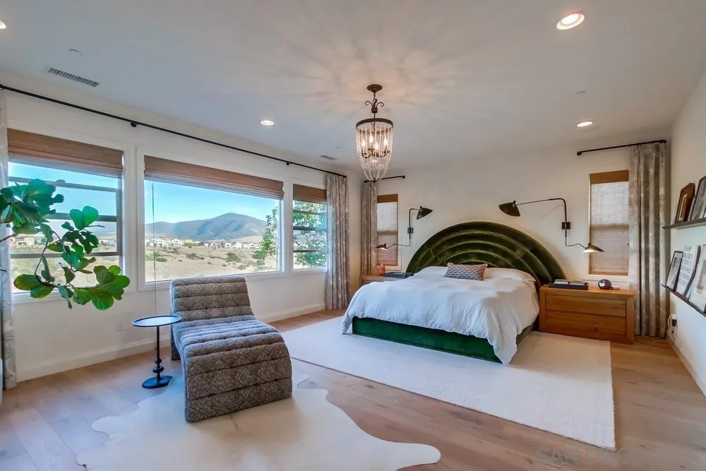 15497 Tanner Ridge Road San Diego, CA 92127 - Photo 30 of 48 a living room with furniture and a potted plant