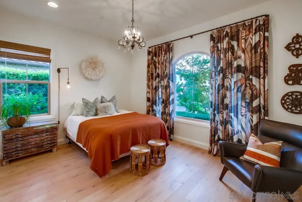 15497 Tanner Ridge Road San Diego, CA 92127 - Photo 41 of 48 a bed sitting in a room next to a window