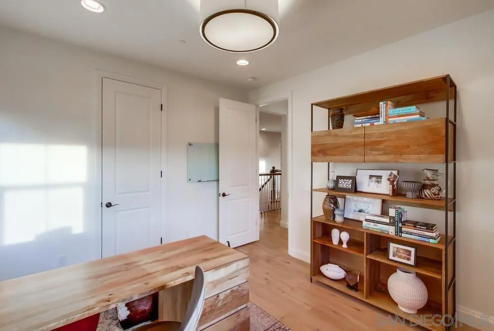 15497 Tanner Ridge Road San Diego, CA 92127 - Photo 44 of 48 a view of kitchen with cabinets and wooden floor