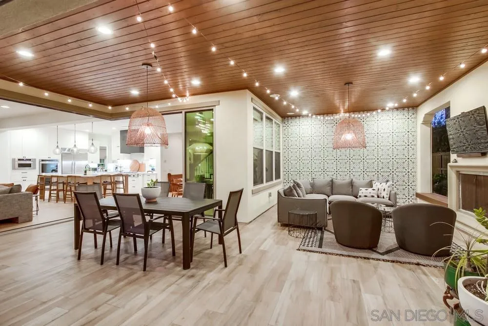15497 Tanner Ridge Road San Diego, CA 92127 - Photo 7 of 48 a view of a dining room with furniture window and wooden floor
