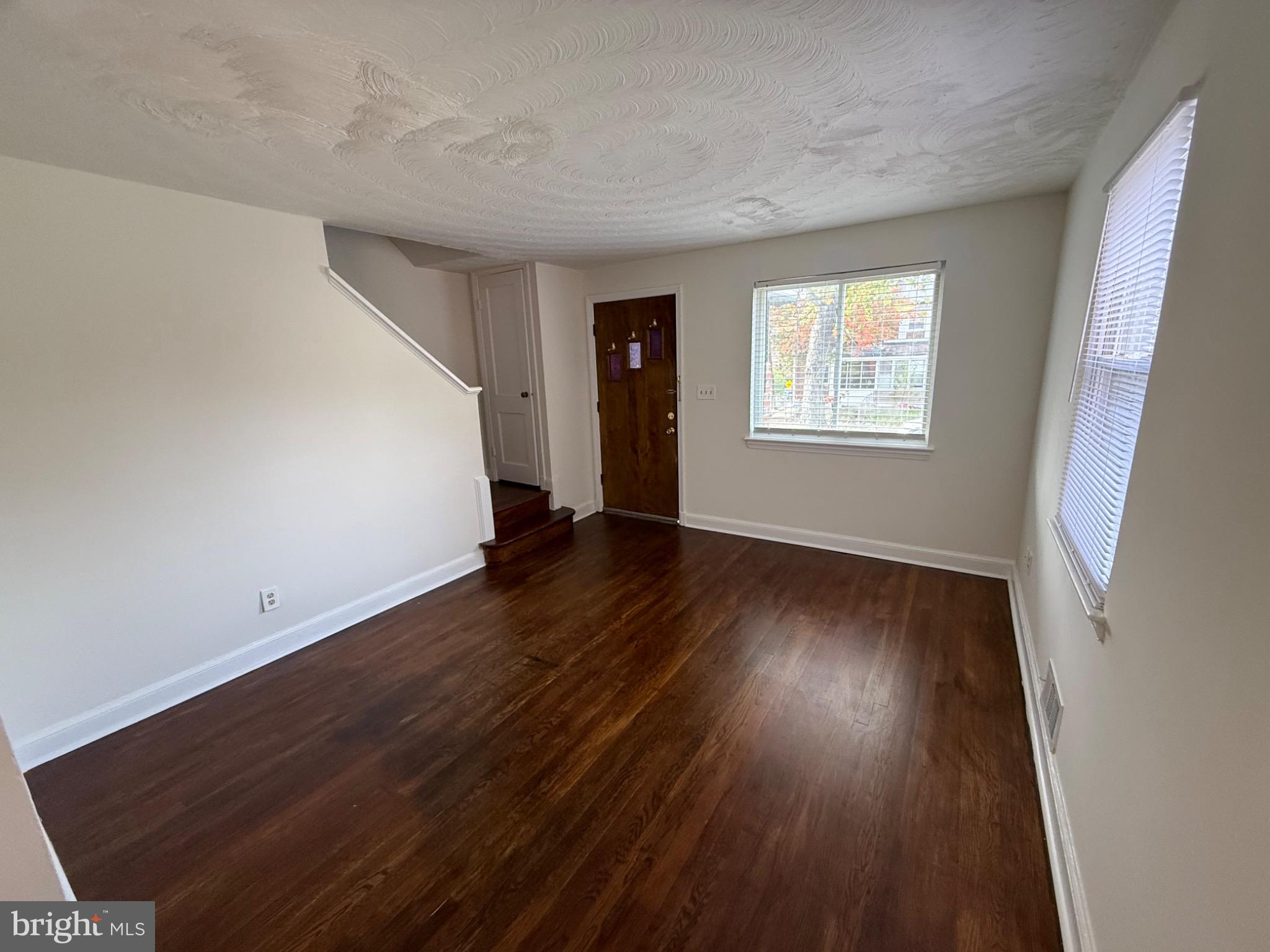 374 Chaplin Street Southeast Washington, DC 20019 - Photo 15 of 23 a view of a room with wooden floor and window