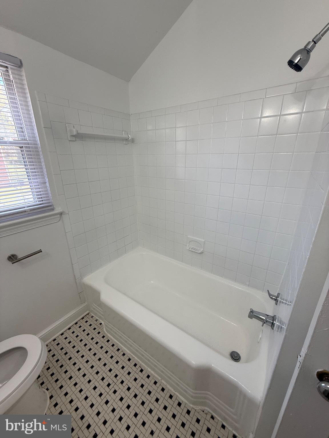 374 Chaplin Street Southeast Washington, DC 20019 - Photo 6 of 23 a bathroom with a bathtub and a toilet
