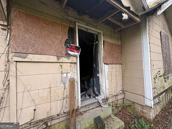 a backyard of a building with trees
