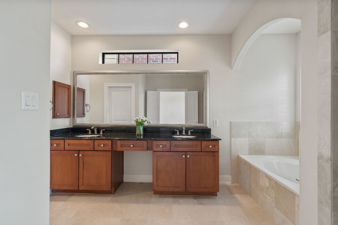 121 Roy Street Houston, TX 77007 - Photo 15 of 33 a kitchen with a sink and cabinets