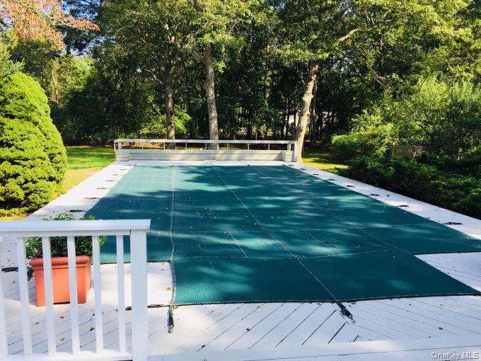 58 Old Depot Road Quogue, NY 11959 - Photo 24 of 28 a view of a house with a yard