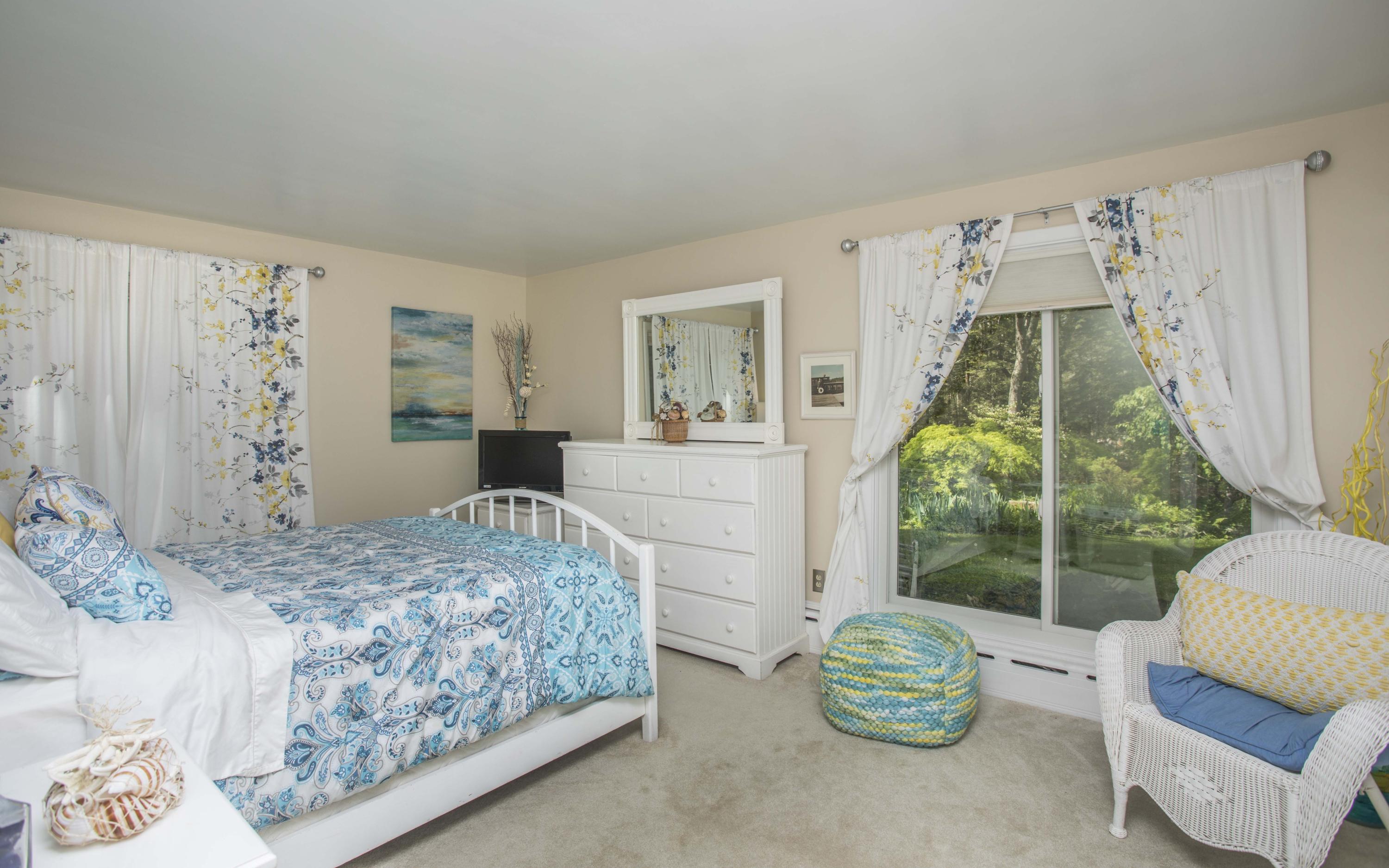 14 Ridge Road North Falmouth, MA 02556 - Photo 12 of 22 a bedroom with a bed and a window