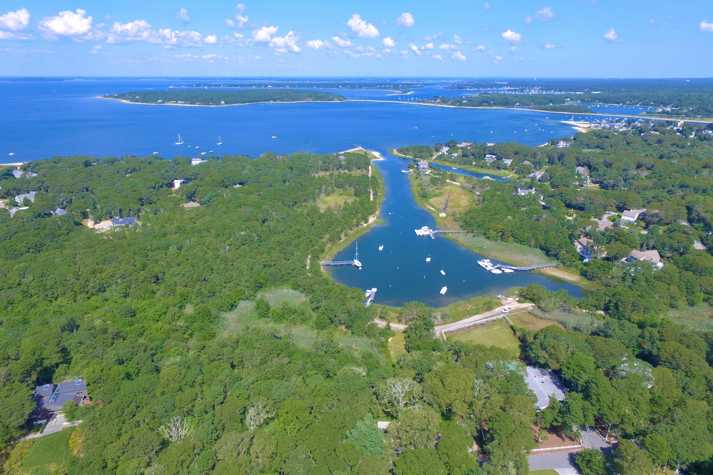 14 Ridge Road North Falmouth, MA 02556 - Photo 2 of 22 a view of an ocean and a yard
