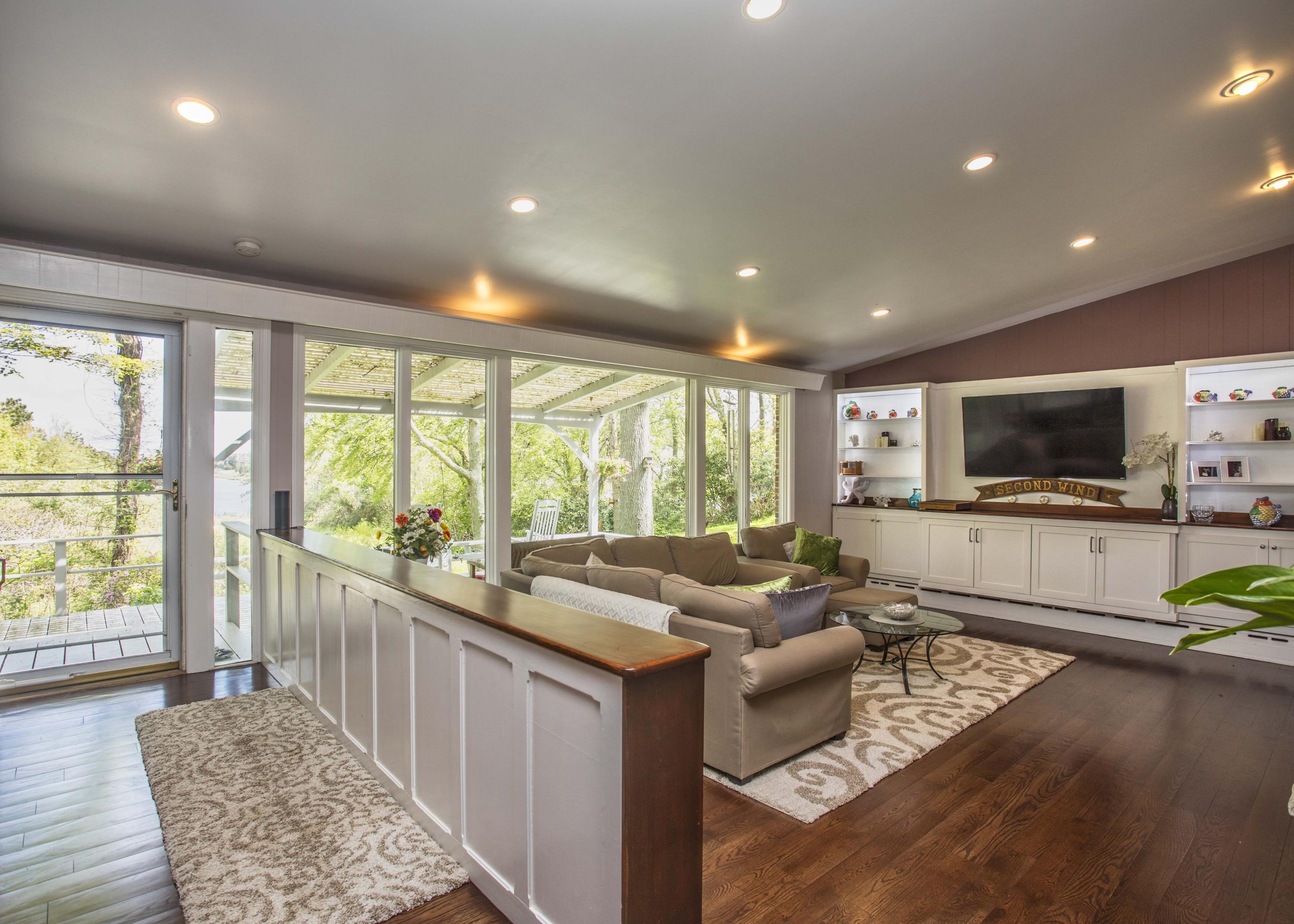 14 Ridge Road North Falmouth, MA 02556 - Photo 3 of 22 a living room with furniture and a flat screen tv
