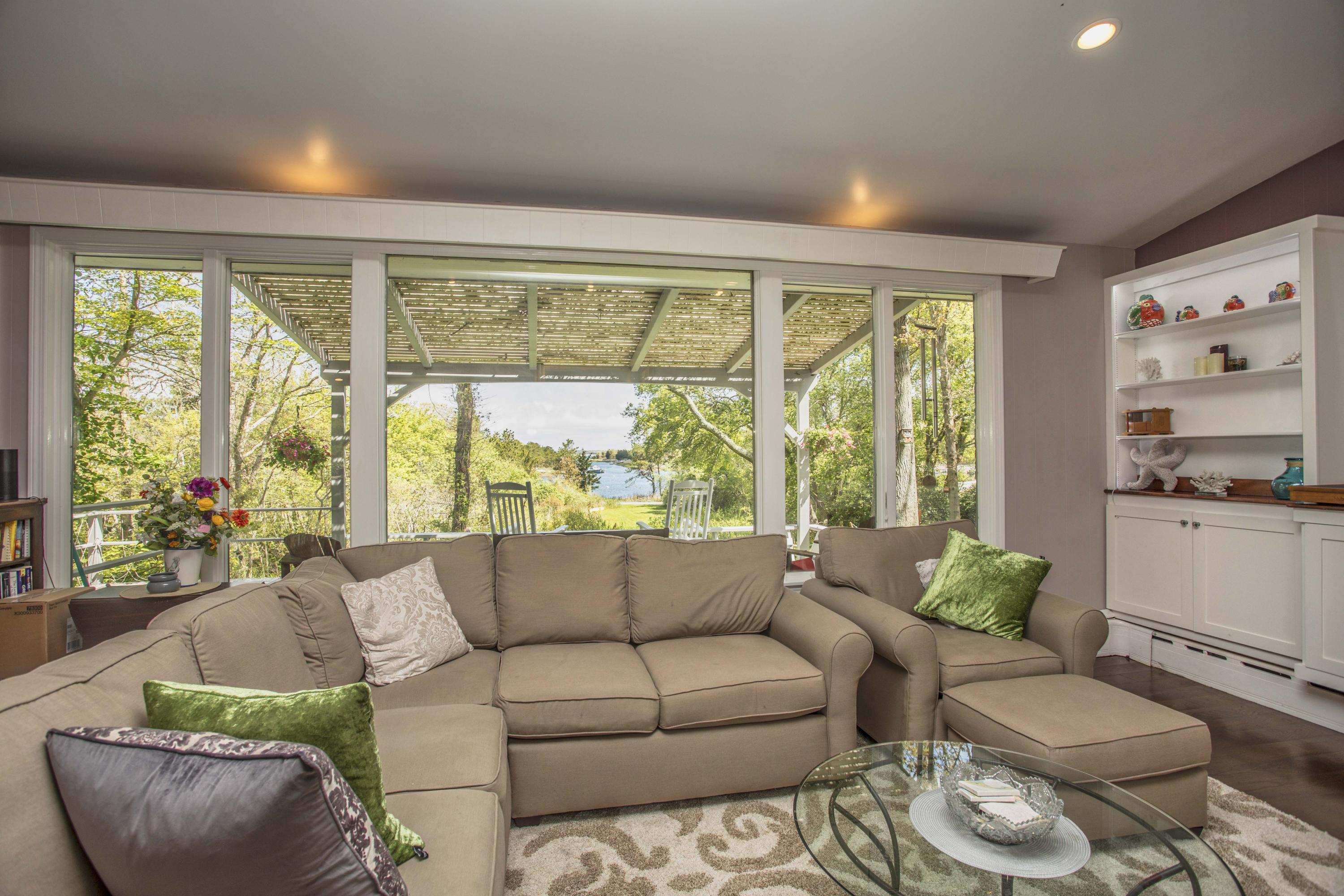 14 Ridge Road North Falmouth, MA 02556 - Photo 5 of 22 a living room with furniture and a large window