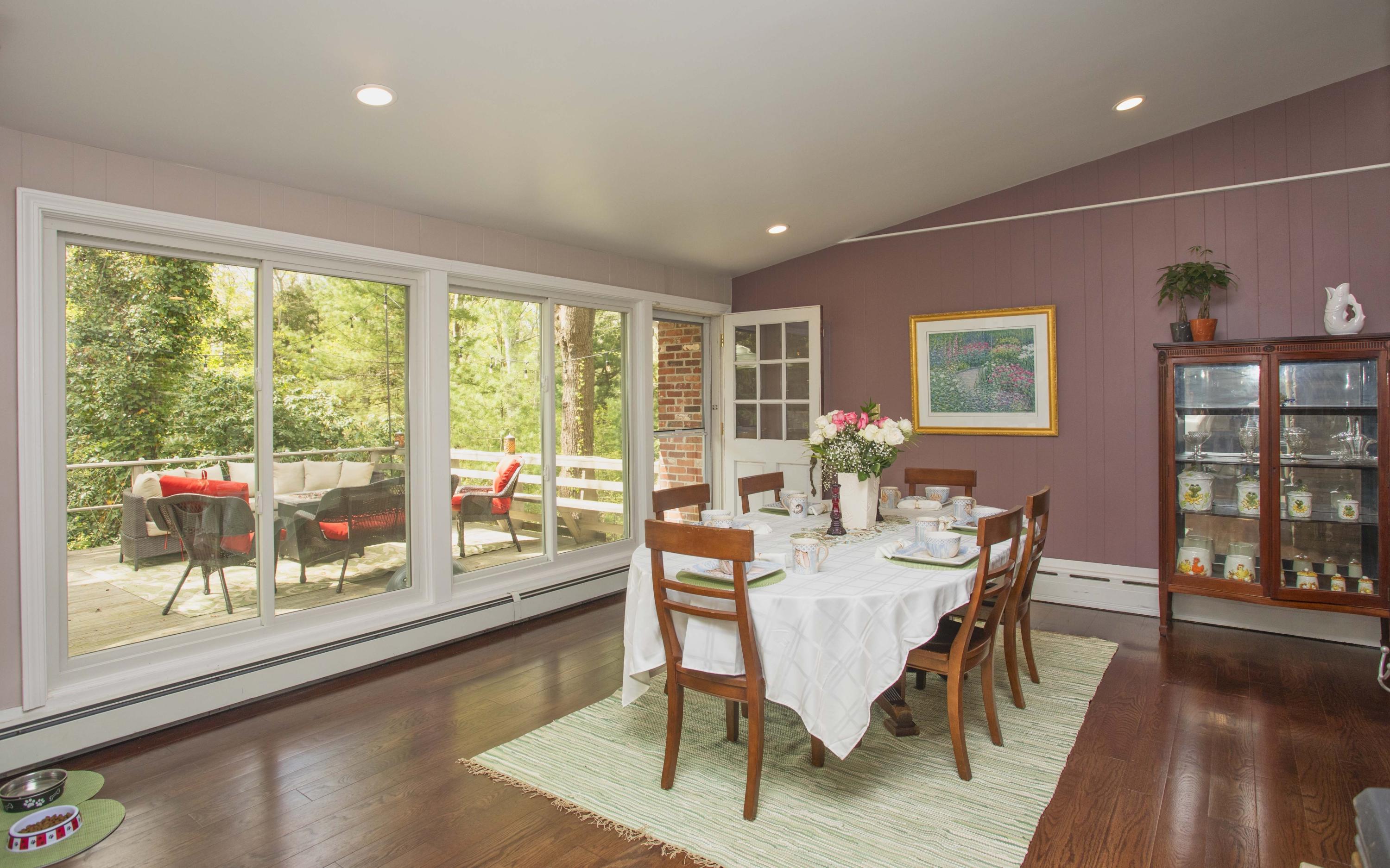 14 Ridge Road North Falmouth, MA 02556 - Photo 7 of 22 a view of a dining room with furniture window and wooden floor