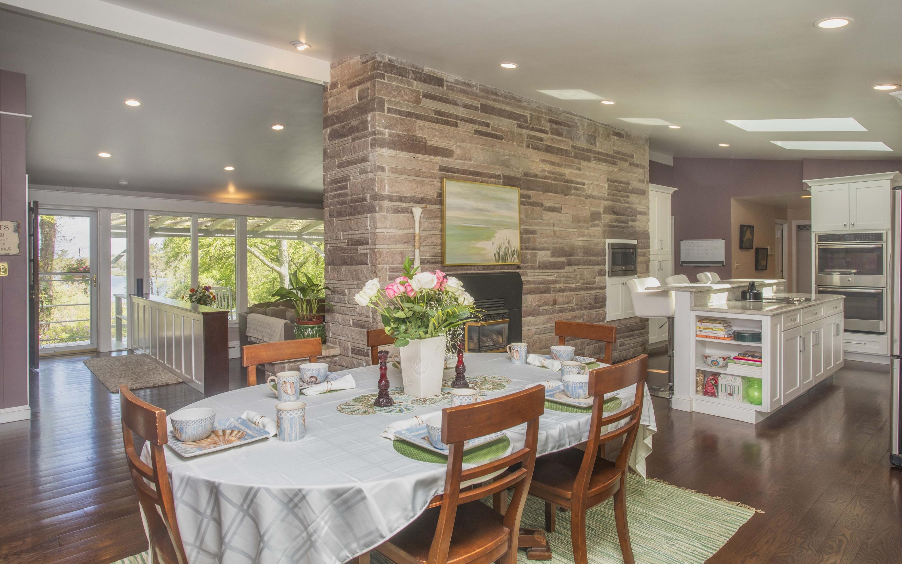 14 Ridge Road North Falmouth, MA 02556 - Photo 8 of 22 a dining room with furniture and wooden floor