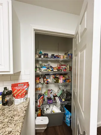 a room with storage and utility