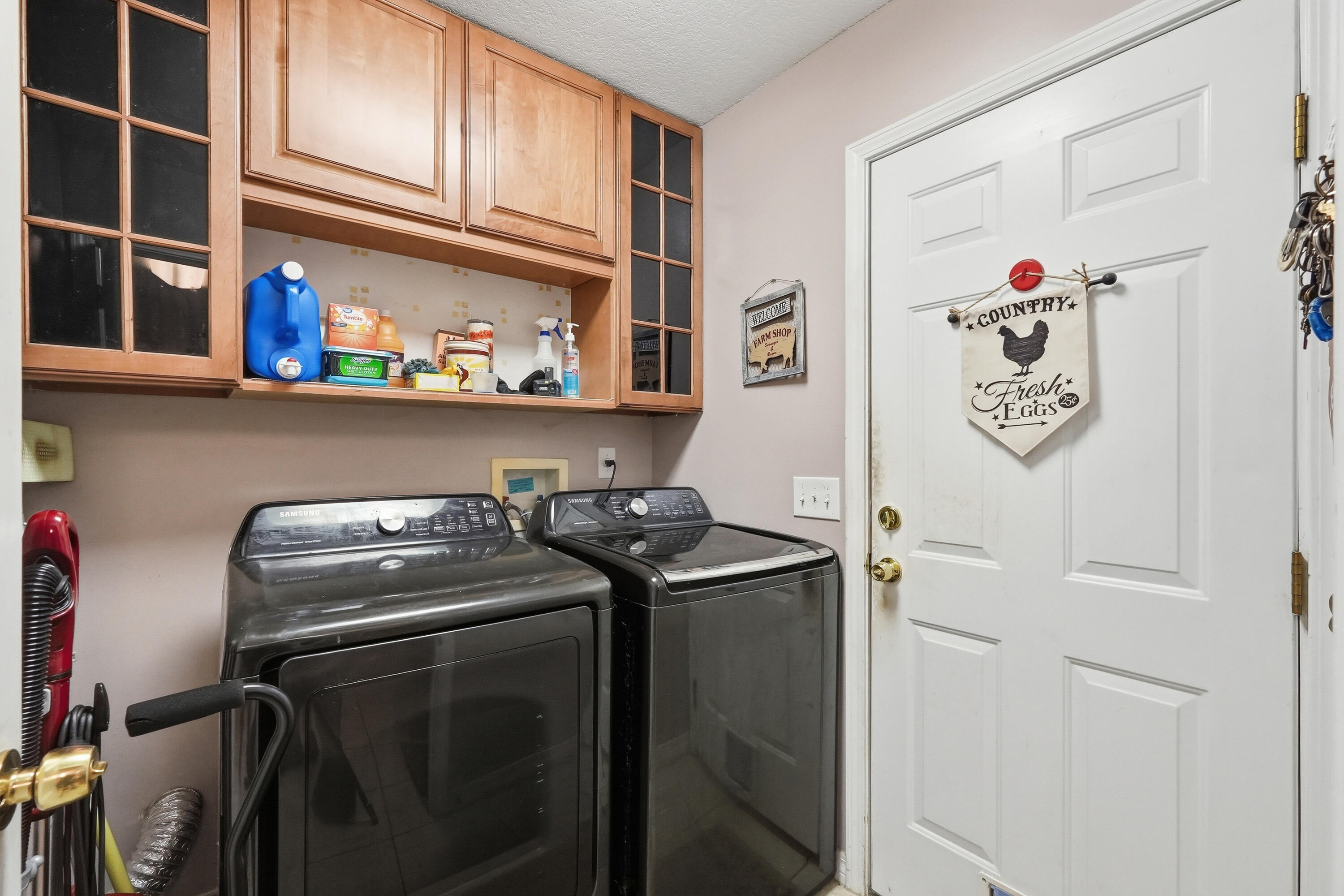 4237 Melton Road Milton, FL 32583 - Photo 24 of 43 a utility room with dryer and washer