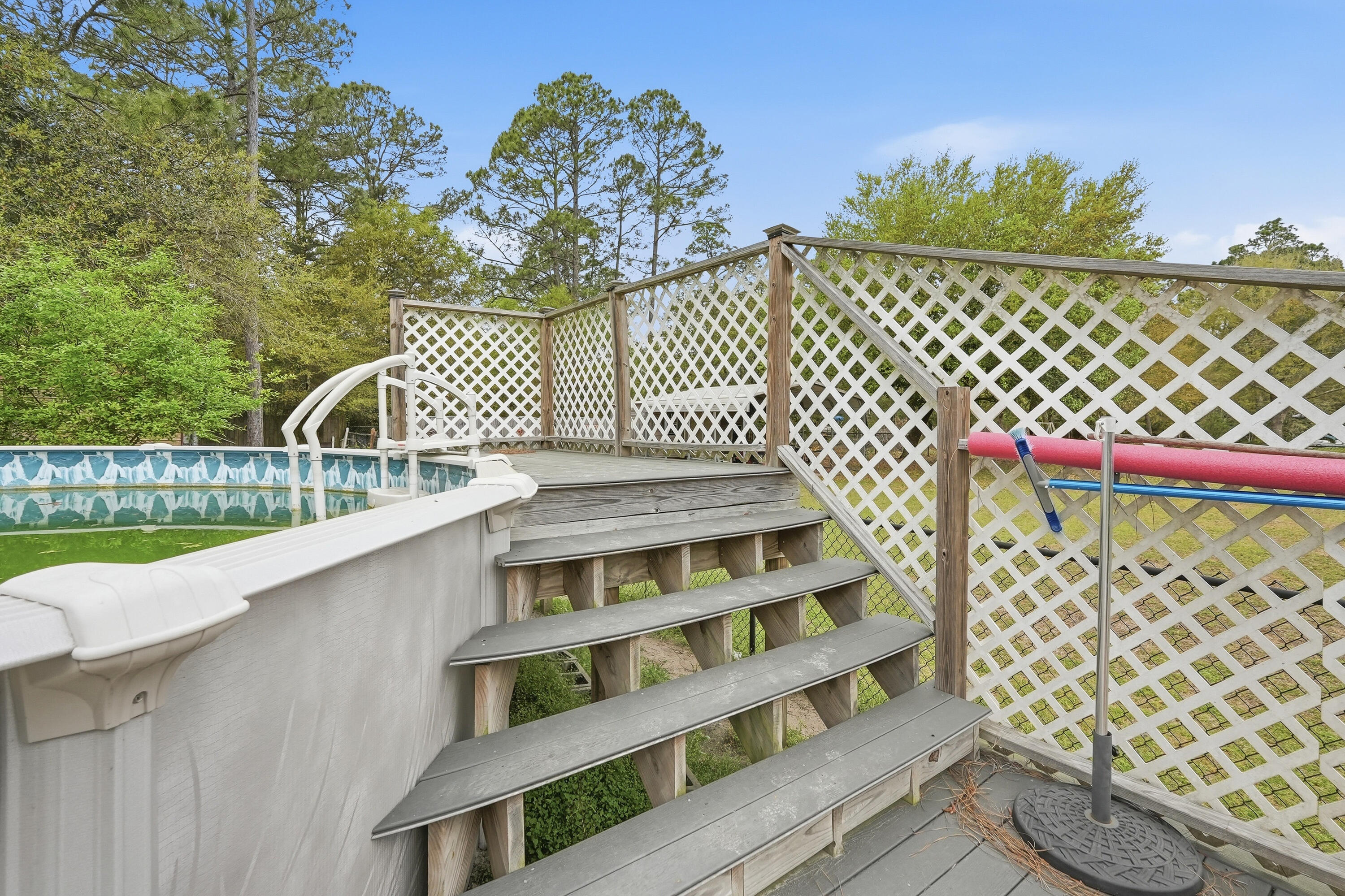 4237 Melton Road Milton, FL 32583 - Photo 35 of 43 a view of a balcony with wooden fence