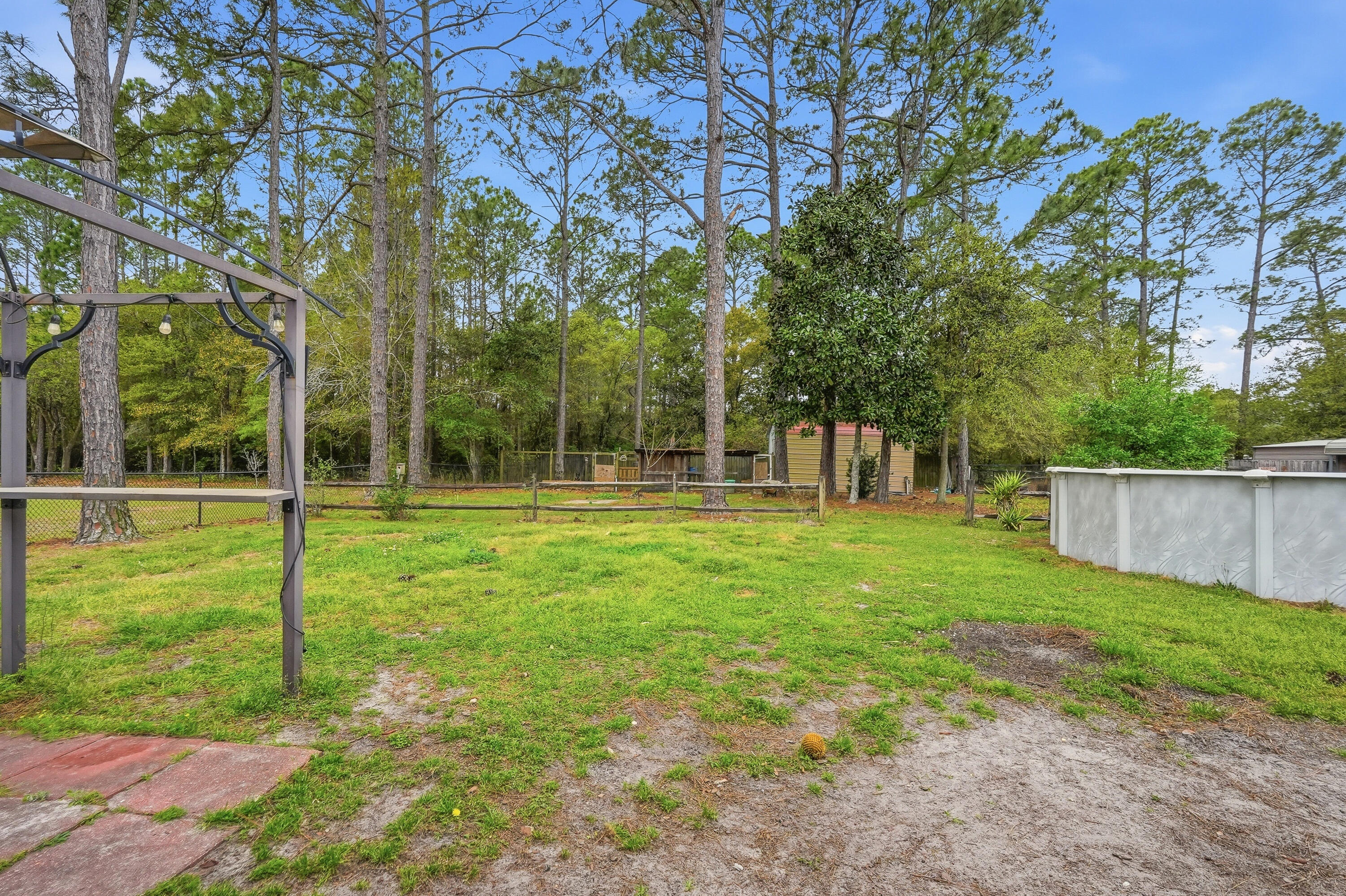 4237 Melton Road Milton, FL 32583 - Photo 36 of 43 a view of a park with large trees