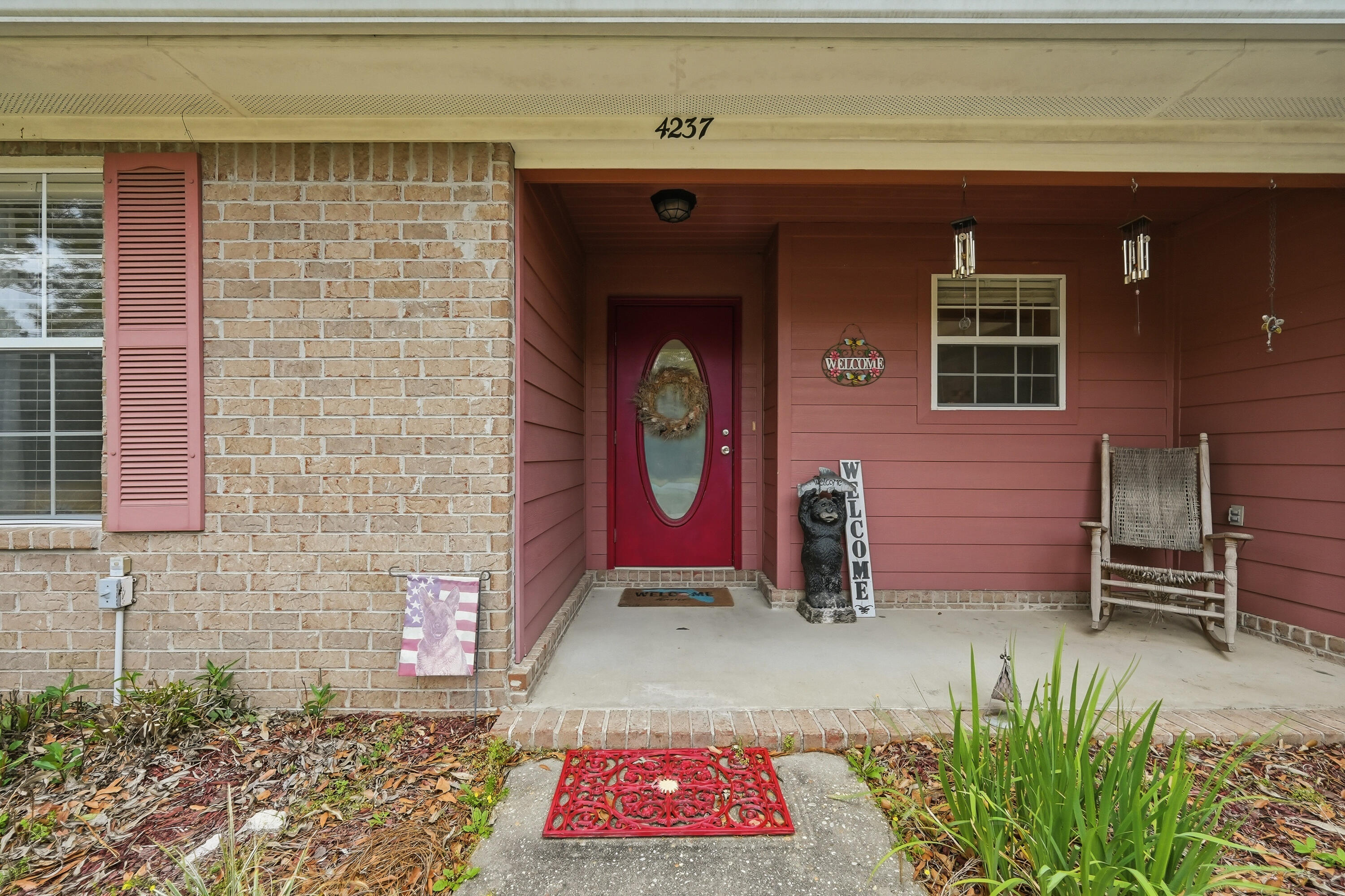 4237 Melton Road Milton, FL 32583 - Photo 5 of 43 a front view of a house with entryway