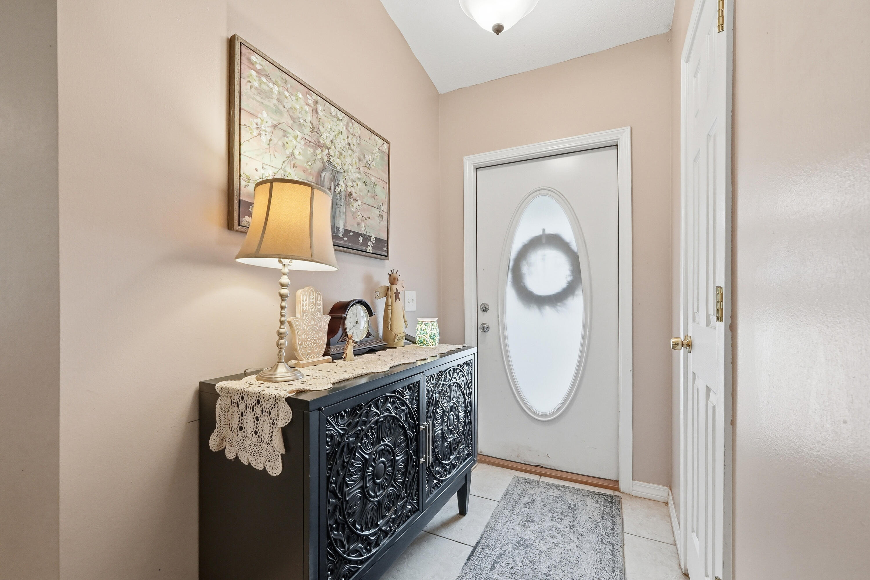 4237 Melton Road Milton, FL 32583 - Photo 6 of 43 a bathroom with mirror and sink