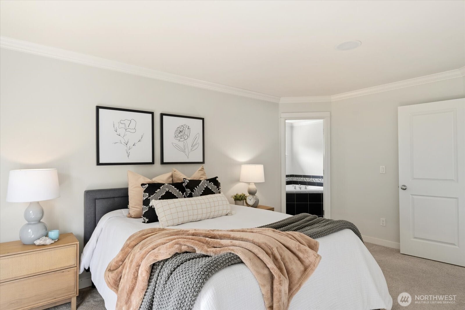 12102 Northeast 174th Street, Unit 1 Bothell, WA 98011 - Photo 18 of 40 a bedroom with a bed and a lamp