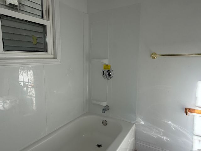 a bathroom with a bathtub