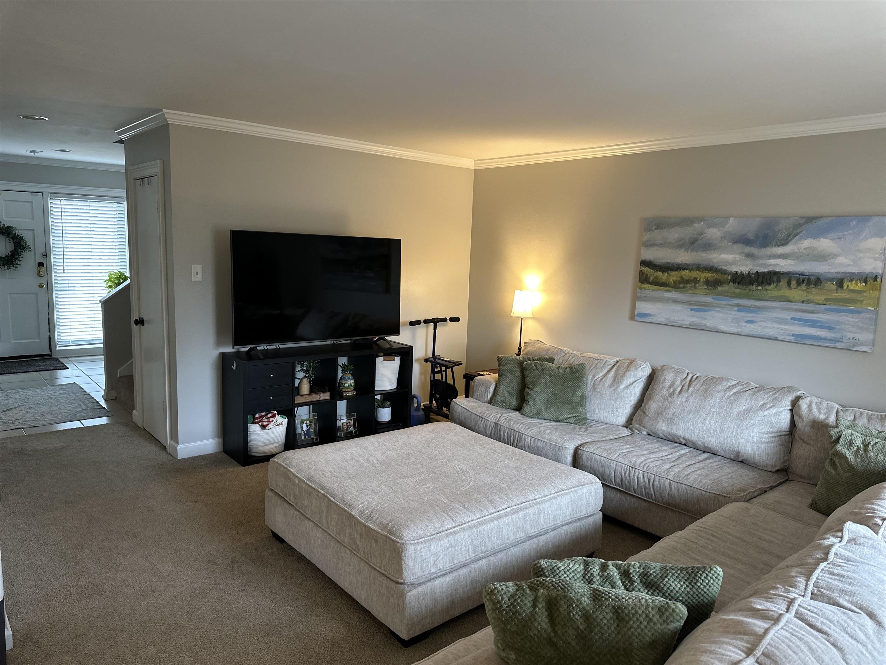 3081 Rising Sun Road, Unit 46 Lakeland, TN 38002 - Photo 12 of 30 a living room with furniture and a flat screen tv