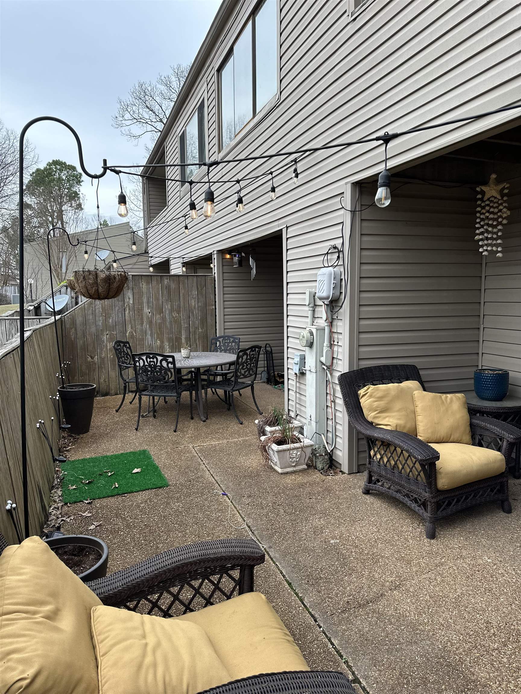3081 Rising Sun Road, Unit 46 Lakeland, TN 38002 - Photo 28 of 30 a backyard of a house with barbeque oven table and chairs