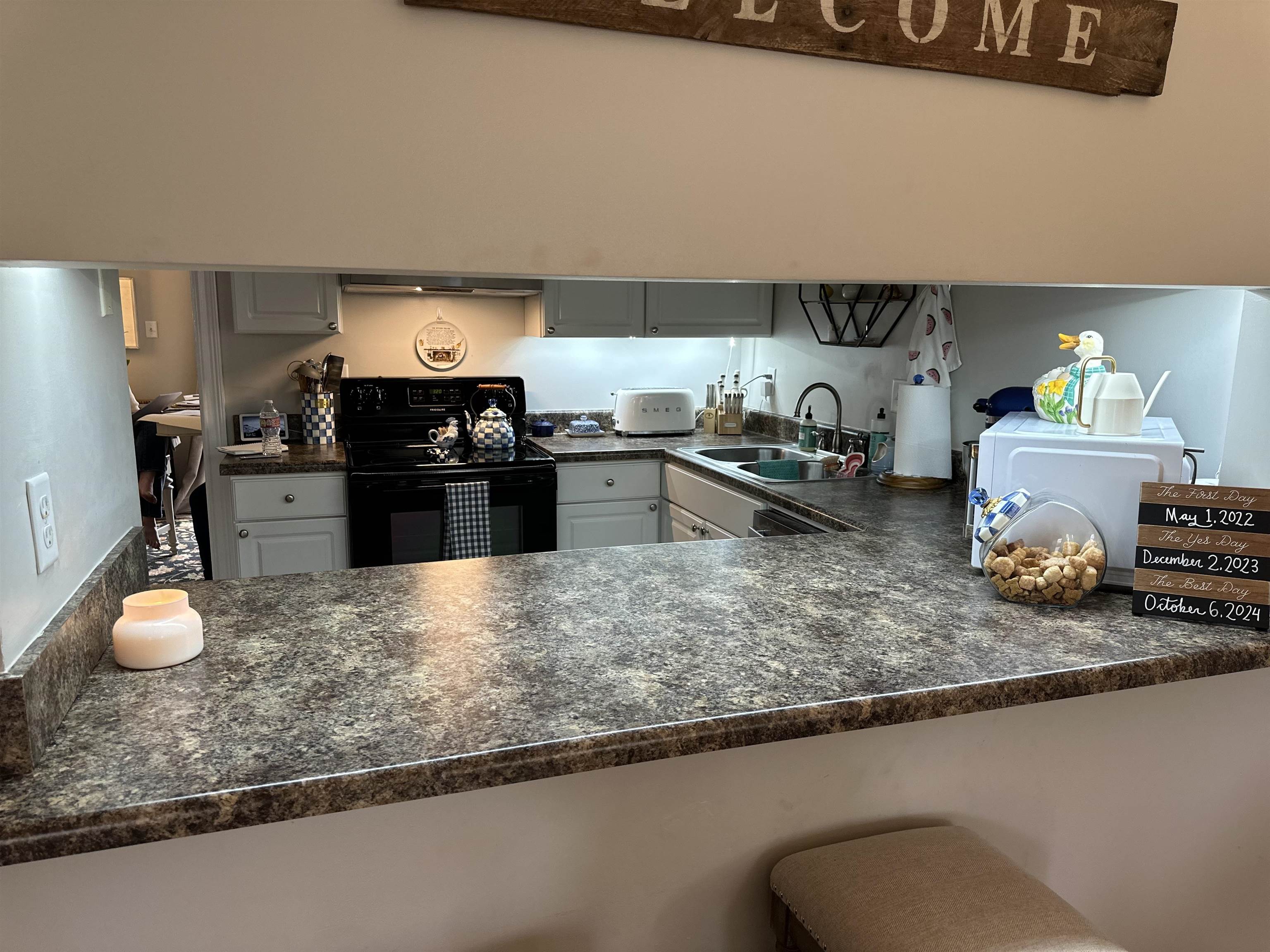 3081 Rising Sun Road, Unit 46 Lakeland, TN 38002 - Photo 7 of 30 a kitchen with a sink a stove and cabinets