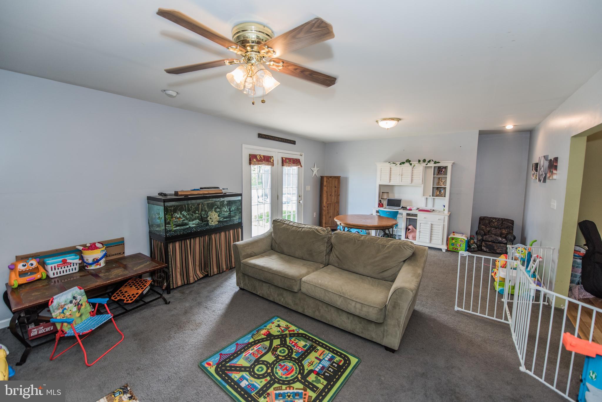 406 East 6th Avenue Ranson, WV 25438 - Photo 22 of 36 Family room off kitchen leading to rear patio