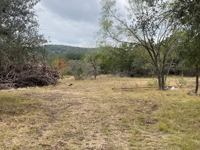 a view of lake with green space