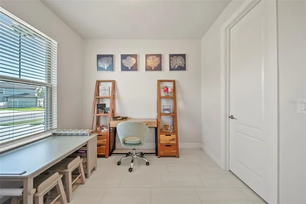 a room that has a chair and a chair in it