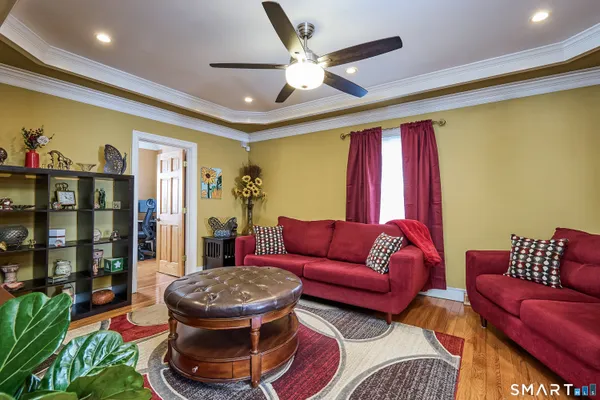 a living room with furniture and a rug