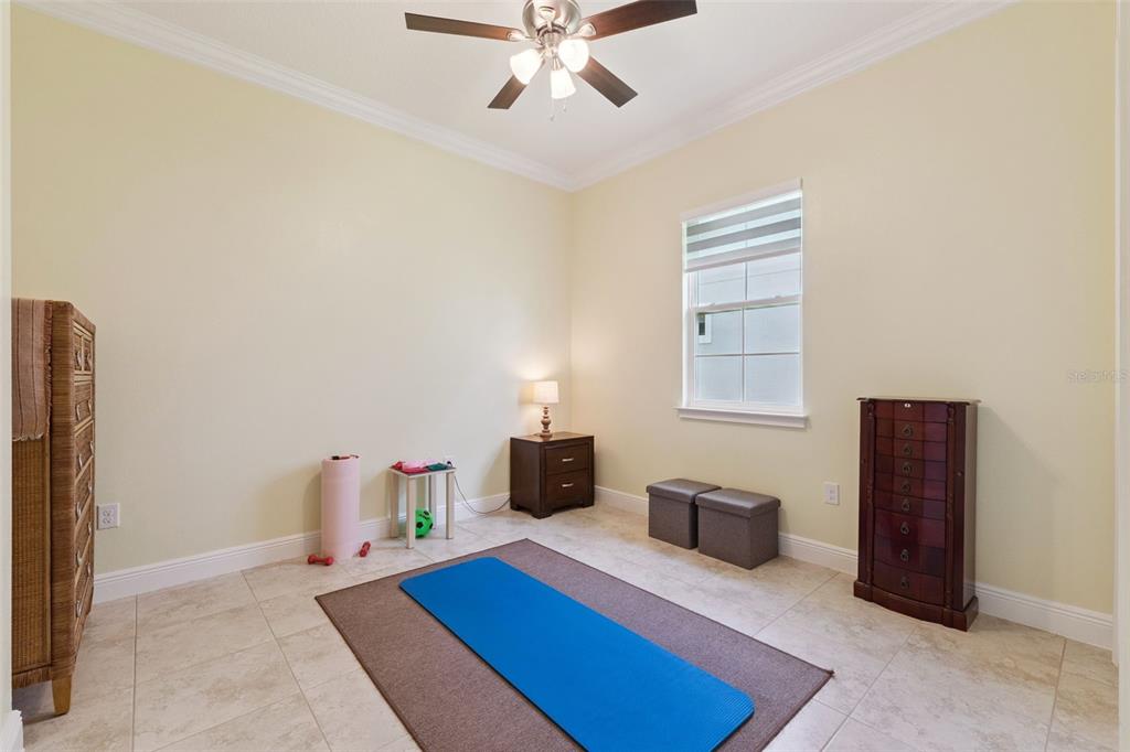 2665 Meadowedge Loop St. Cloud, FL 34772 - Photo 40 of 53 a bedroom with furniture and a window