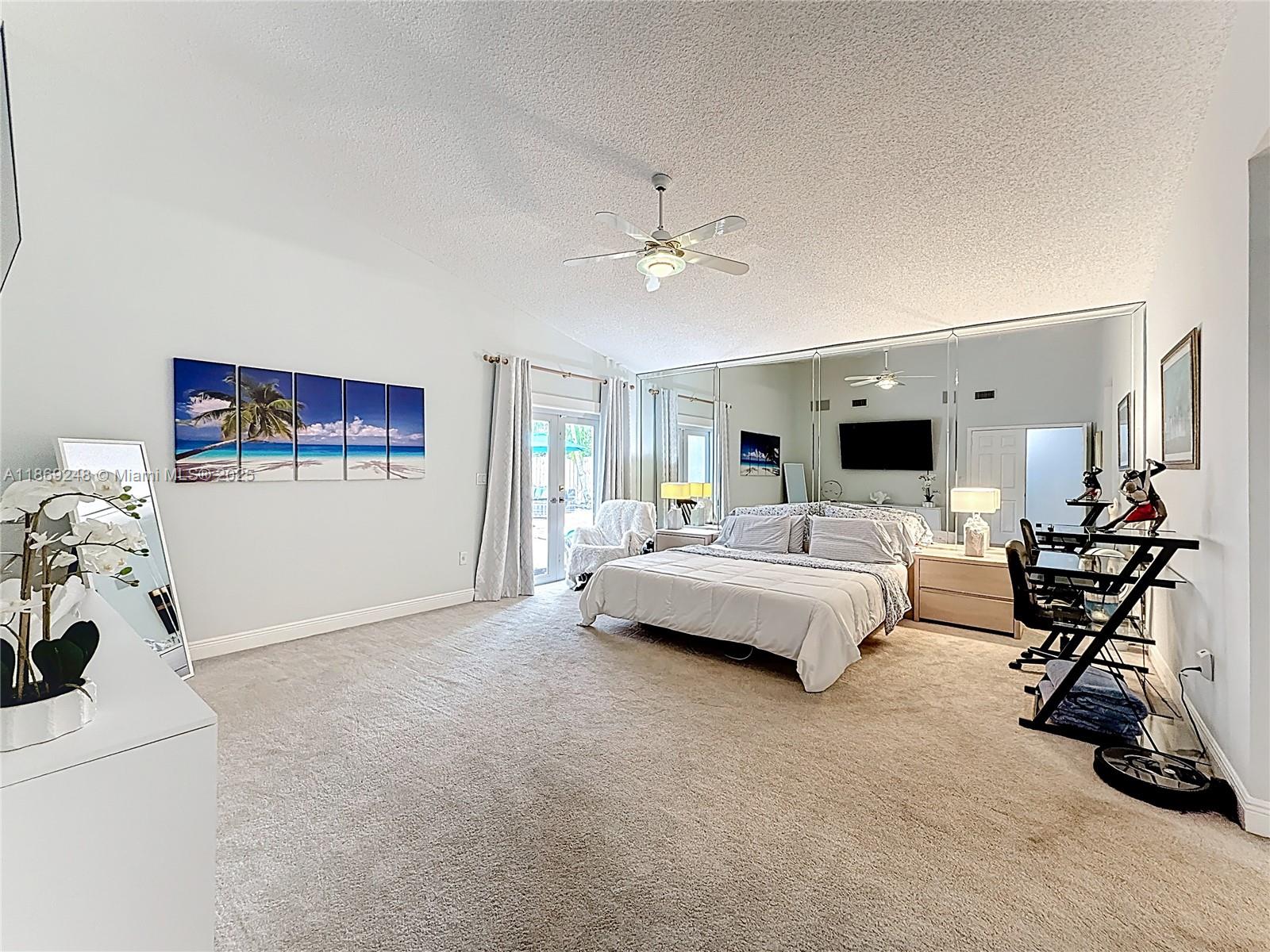 10462 Southwest 121st Street Miami, FL 33176 - Photo 22 of 35 a living room with furniture and a flat screen tv