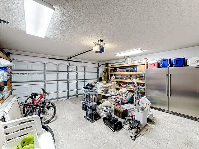 a swimming pool with outdoor seating yard