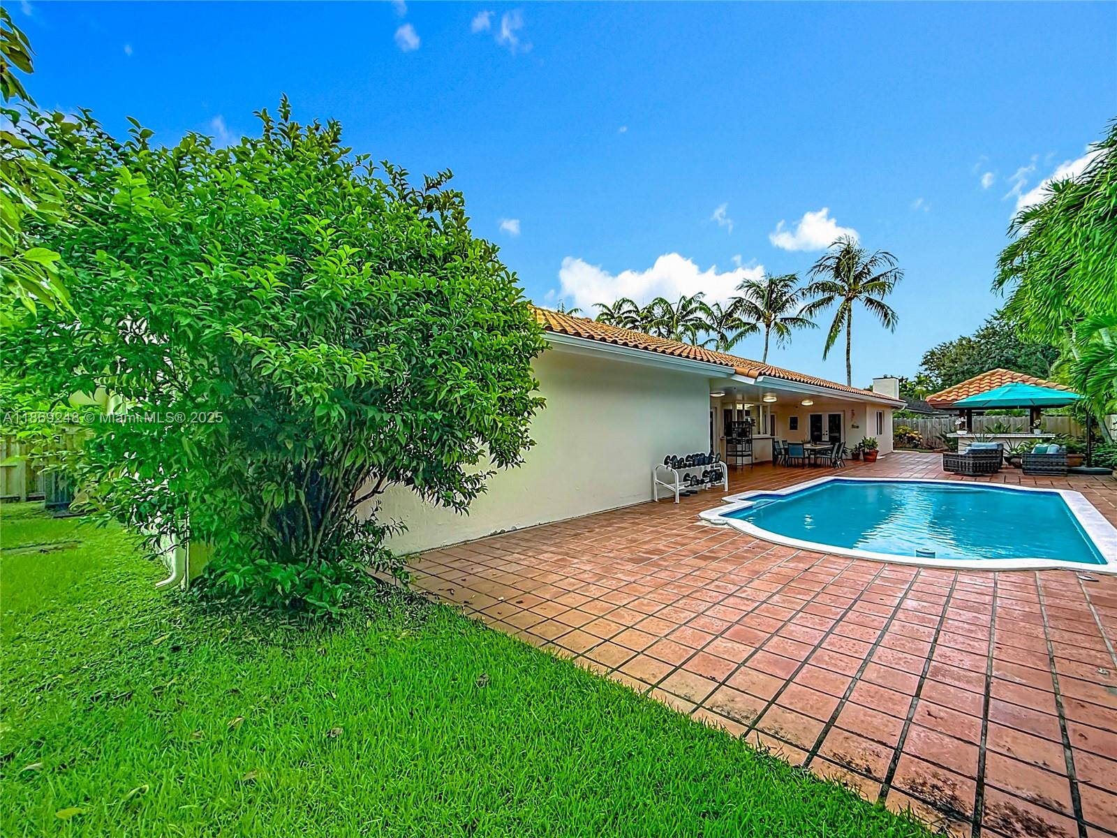 10462 Southwest 121st Street Miami, FL 33176 - Photo 34 of 35 a view of a backyard