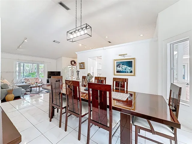 a view of a dining room with furniture