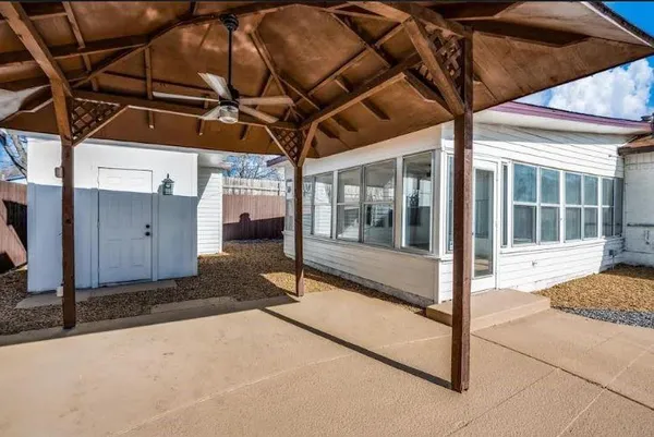 a view of a backyard of a house