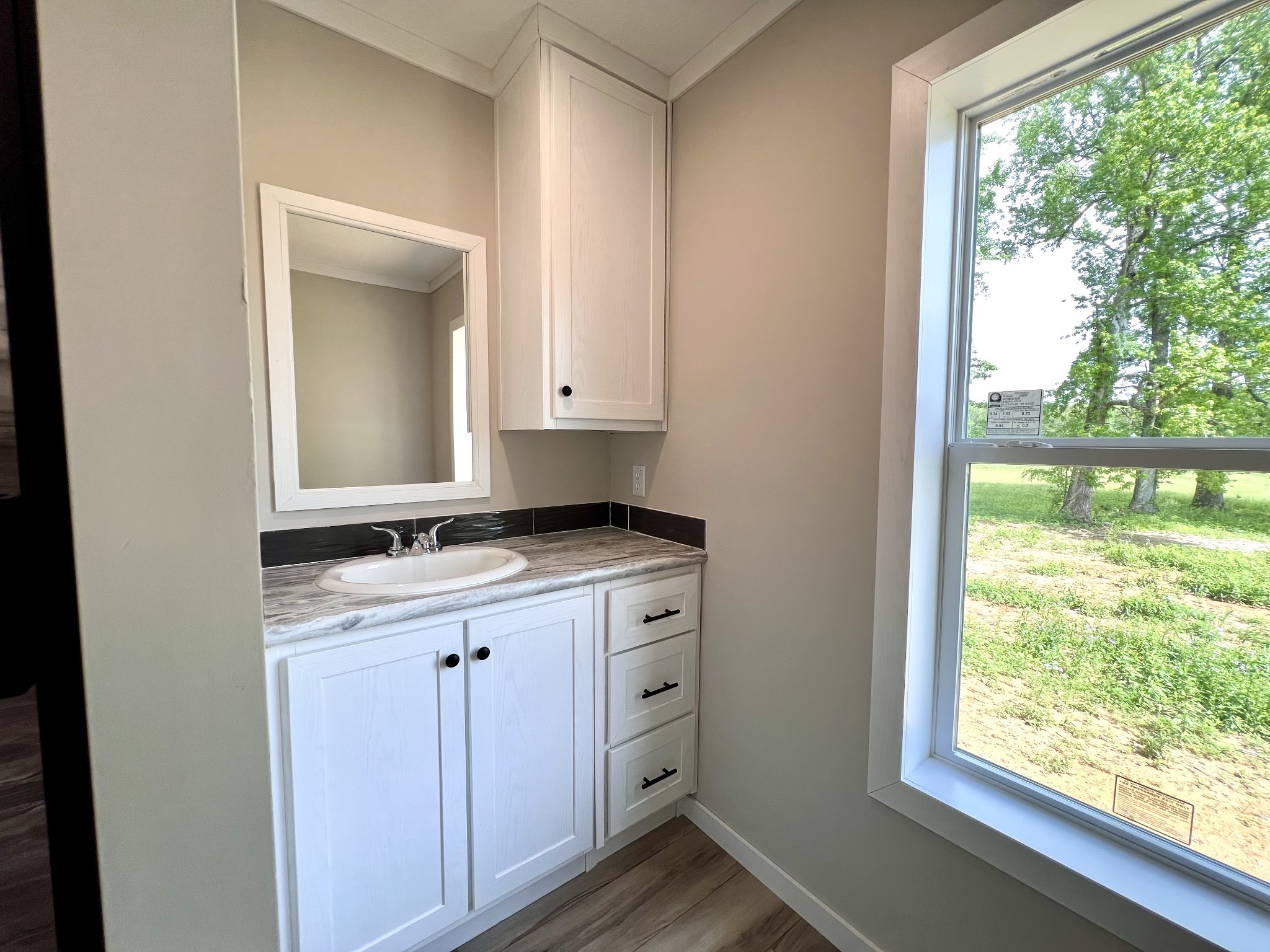 1081 McAfee Road Morrison, TN 37357 - Photo 23 of 39 a view of cabinets with wooden floor